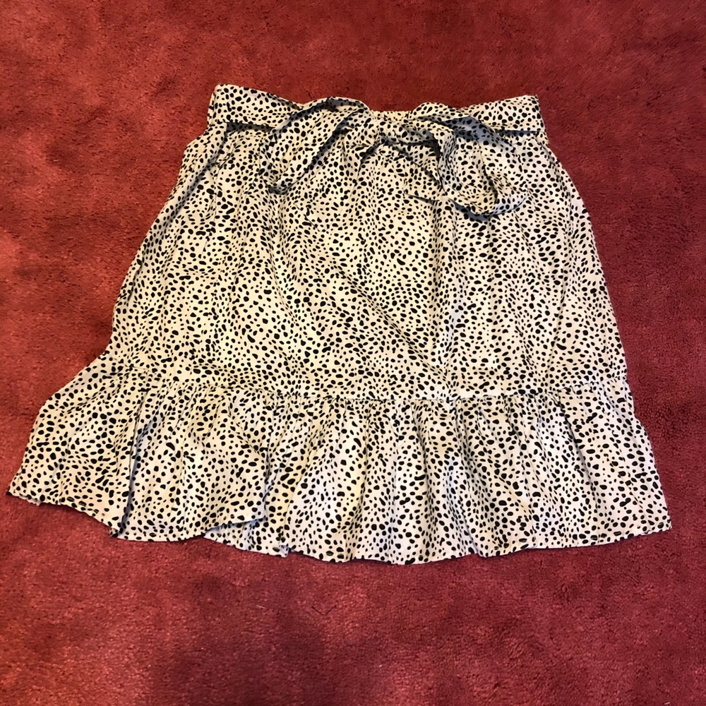 White with black dotted skirt